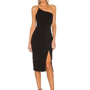 Likely size 6 black dress (midi) . Never worn